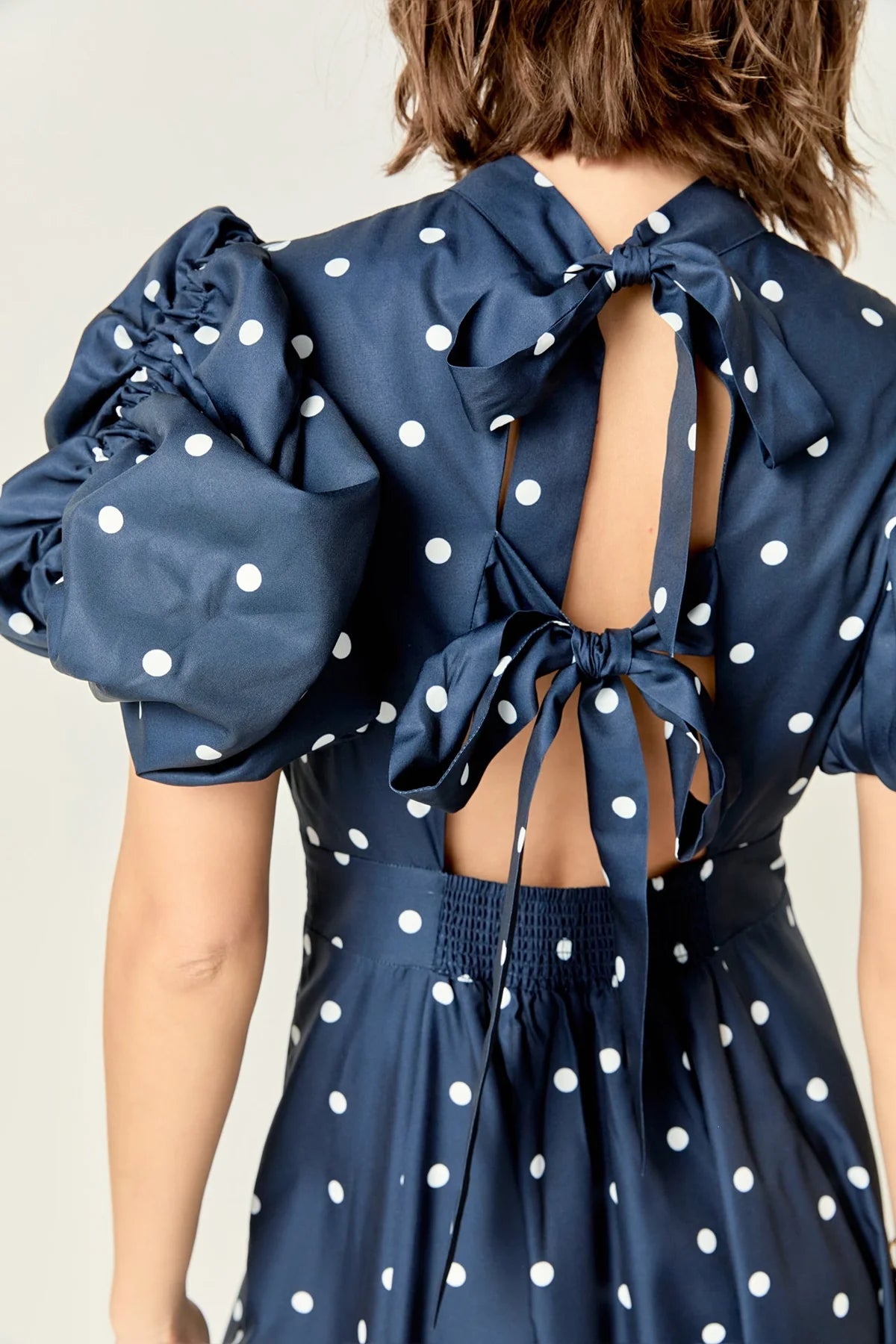 Open back dot dress