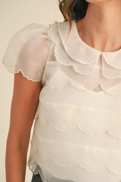 Scalloped cream blouse