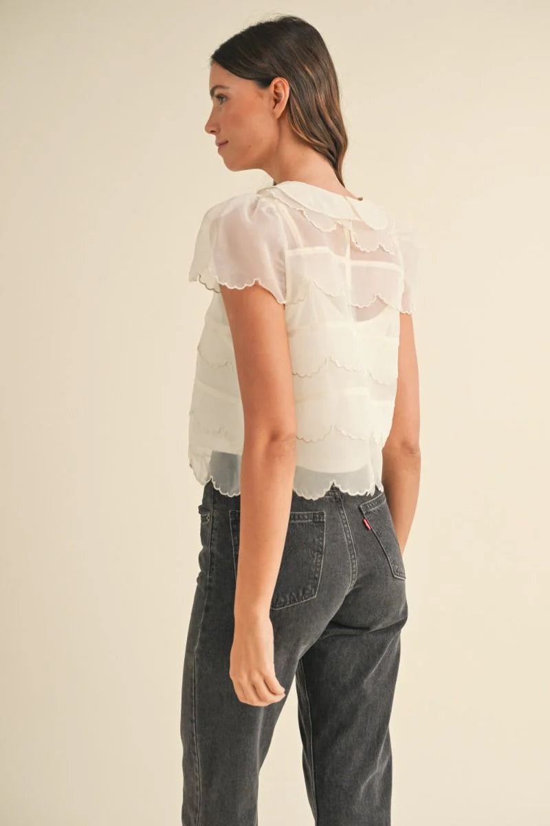 Scalloped cream blouse