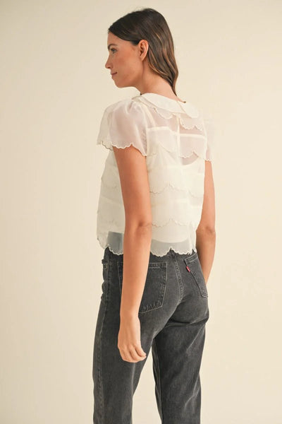 Scalloped cream blouse